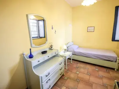 Letto o letti in una camera di Villa Anna