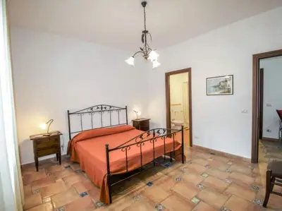 Letto o letti in una camera di Villa Anna