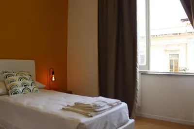 Letto o letti in una camera di Sicilian Vibes House in Centro