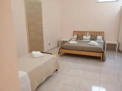 Letto o letti in una camera di Grace's House