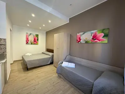 Letto o letti in una camera di Casabella