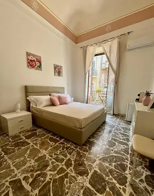 Letto o letti in una camera di Casa MiRè