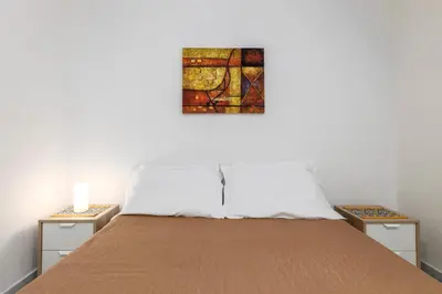 Letto o letti in una camera di Ciuri's apartment