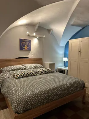 Letto o letti in una camera di Sicilian Vibes Flat in Palazzo Storico
