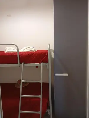 Letto o letti a castello in una camera di ETNA e MARE