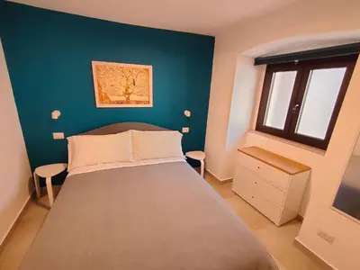 Letto o letti in una camera di Tophouse Catania Centro - Blue Apt