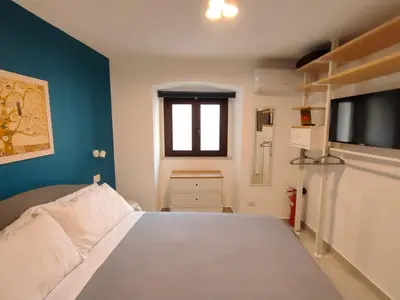 Letto o letti in una camera di Tophouse Catania Centro - Blue Apt