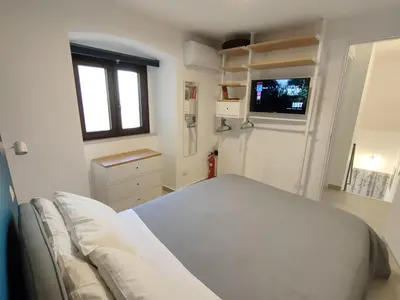 Letto o letti in una camera di Tophouse Catania Centro - Blue Apt