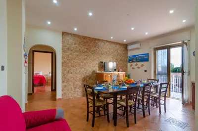 Cucina o angolo cottura di Casa Aurora a due passi dalla ferrovia