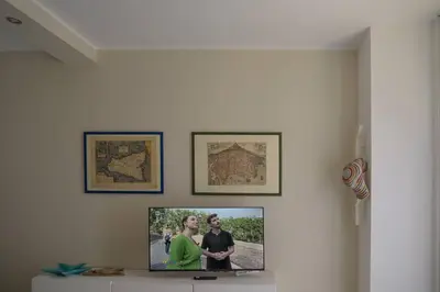 TV o dispositivi per l'intrattenimento presso Casa Vacanze Marta Aci Trezza