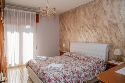 Letto o letti in una camera di Casa Montegrappa - tra Etna e Mare Parcheggio gratuito