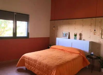 Letto o letti in una camera di Casa Vacanza L'ulivo