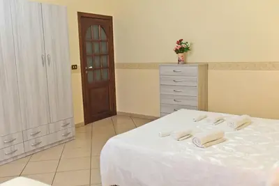 Letto o letti in una camera di Sea View House, Riposto