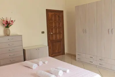 Letto o letti in una camera di Sea View House, Riposto