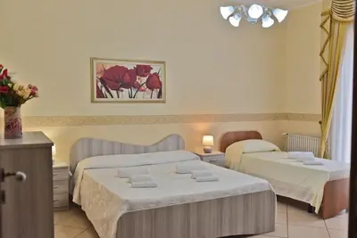 Letto o letti in una camera di Sea View House, Riposto