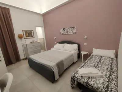Letto o letti in una camera di Tophouse Catania Centro - Velvet Apt