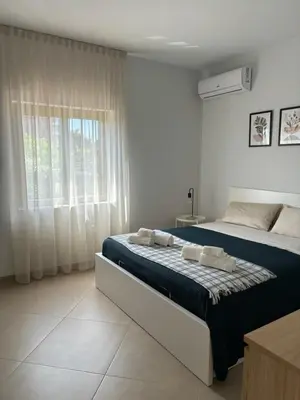 Letto o letti in una camera di Viola's Charming House