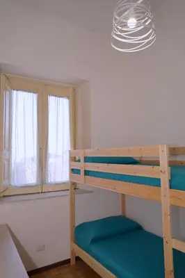 Letto o letti in una camera di Apartment with terrace in the city centre of Zafferana Etnea