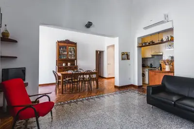 Area soggiorno di Classic Apartment La Maddalena by Wonderful Italy
