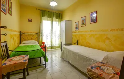Letto o letti in una camera di 2 Bedroom Stunning Apartment In Mascali