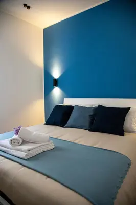 Letto o letti in una camera di Catania Centro, Italia ,Sicilia, Orgahome Appartamento