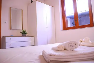 Letto o letti in una camera di La Torre guest house