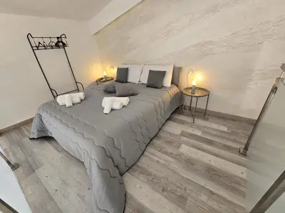Letto o letti in una camera di Fortino living summer