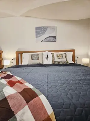 Letto o letti in una camera di Marisol Home