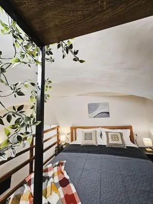 Letto o letti in una camera di Marisol Home