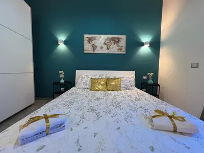 Letto o letti in una camera di Leoscar Apartment in Catania center Self Check-in