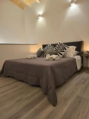 Letto o letti in una camera di Fortino living spring