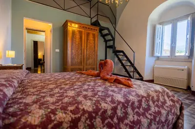 Letto o letti in una camera di Villa Franca La Casina