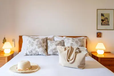 Letto o letti in una camera di Casa Villalba - Appartamento con piscina