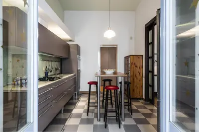 Cucina o angolo cottura di Agata Apartment with Balcony by Wonderful Italy