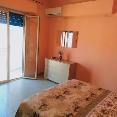Letto o letti in una camera di Mati Rooms