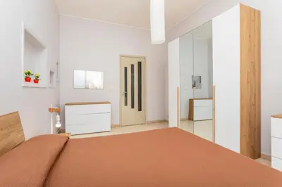 Letto o letti in una camera di Nicola House