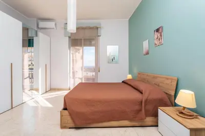 Letto o letti in una camera di Nicola House