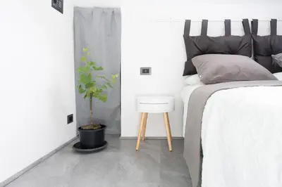 Letto o letti in una camera di VOLCANO'S SUITE - UVA - The First Sustainable Eco - Chic Suite in Sicily - Room