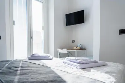 Letto o letti in una camera di VOLCANO'S SUITE - FICO D'INDIA - The First Sustainable Eco - Chic Suite in Sicily