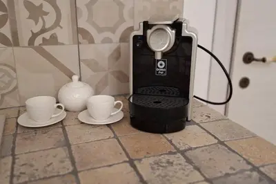 Set per la preparazione di tè e caffè presso Casa vacanze Vico Minaudo