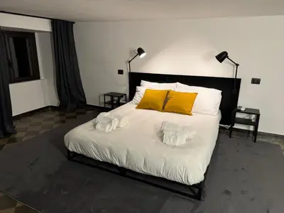 Letto o letti in una camera di MacrHome Catania Centro