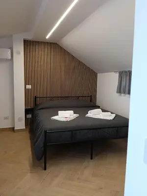 Letto o letti in una camera di A casa di Gigi