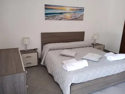 Letto o letti in una camera di A casa di Gigi