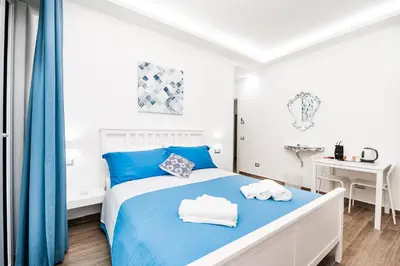 Letto o letti in una camera di DM House & Suite