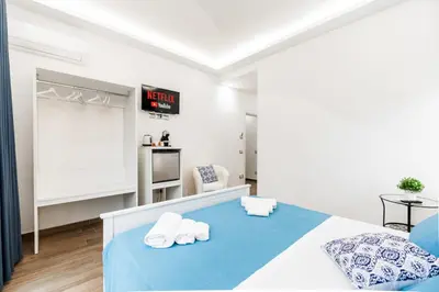 Letto o letti in una camera di DM House & Suite