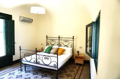 Letto o letti in una camera di Casa Catelli