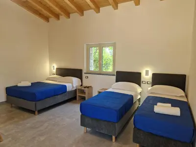 Letto o letti in una camera di Agriturismo Lumia Resort
