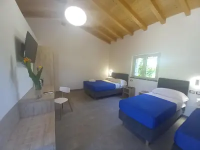 Letto o letti in una camera di Agriturismo Lumia Resort