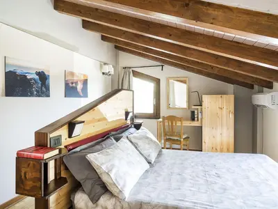 Letto o letti in una camera di Villa Nel Monte