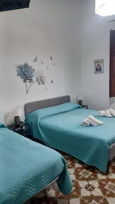 Letto o letti in una camera di Casa vacanza ' A casa dei Nonni 2 '